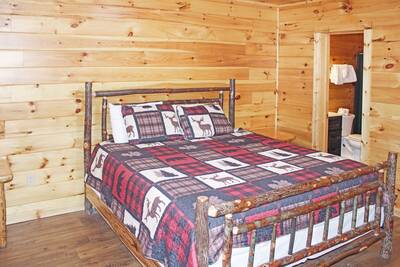 Timber Tree Lodge lower level bedroom with king size bed