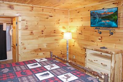 Timber Tree Lodge lower level bedroom with 43inch TV