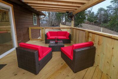 Margaritas at Sunrise - Covered back deck with wicker furniture