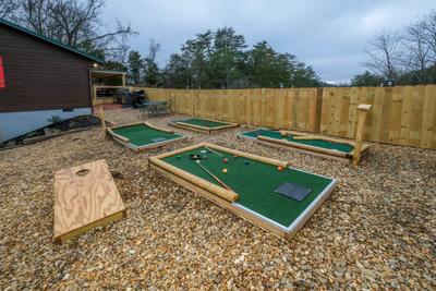 Margaritas at Sunrise - Corn hole boards and 8 hole putt putt course