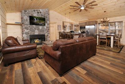 The Hidden End living room with wood burning fireplace