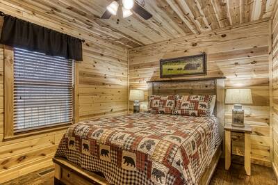 A Mountain Hideaway Lodge - Main level bedroom with queen size bed