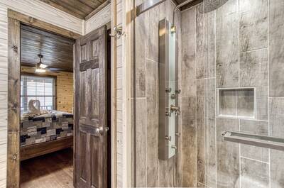Water's Edge bathroom with walk in spa shower