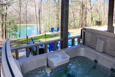 Water's View hot tub overlooking community fishing pond