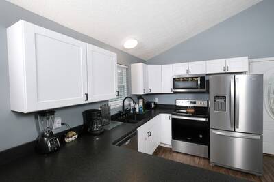 Wolff Lodge - fully furnished kitchen with stainless steel appliances