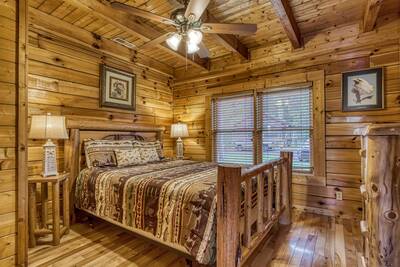 River Livin - Main level bedroom with king size bed