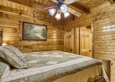 River Livin - Main level bedroom 2 with queen size bed