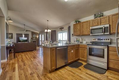 Inn The Vicinity - Fully furnished kitchen with stainless steel appliances