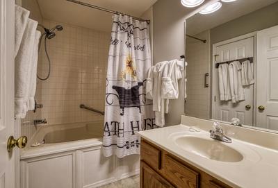 Inn the Vicinity - Bathroom 2 with a whirlpool tub/shower combo