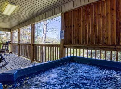 Inn the Vicinity - Covered back deck with hot tub and rocking chairs
