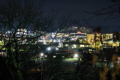 Inn the Vicinity - View of Pigeon Forge at night from covered back deck