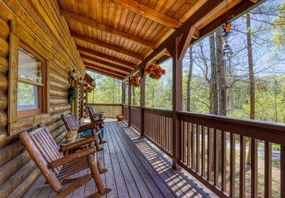 Sweet Dreams wraparound covered deck with rocking chairs