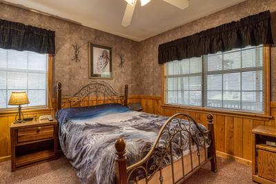 Dances With Wolves main level bedroom with queen size bed