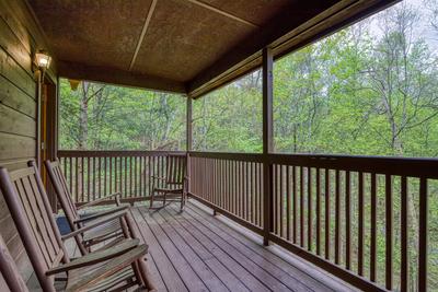 Dances With Wolves covered back deck with rocking chairs