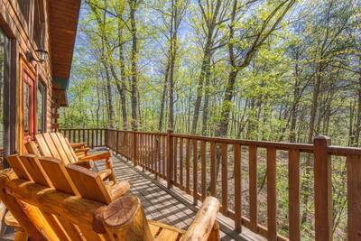 Cedar Lodge - Wrap around deck with rocking chairs