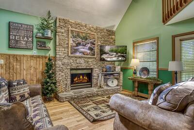 Grandpas Getaway - Living room with stone encased 