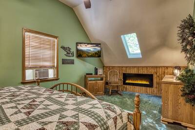 Grandpas Getaway - Upper level bedroom 2 with year round electric fireplace