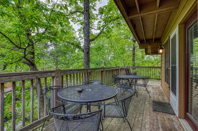 Mountain Side - Back deck with table and chairs