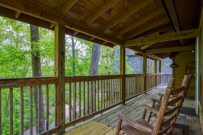 Mountain Side - Covered entry deck with rocking chairs