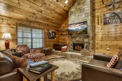S'more Family Fun - Living room with stone encased gas fireplace