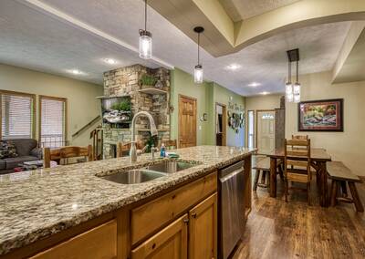 Best Time Ever fully furnished kitchen with granite countertops