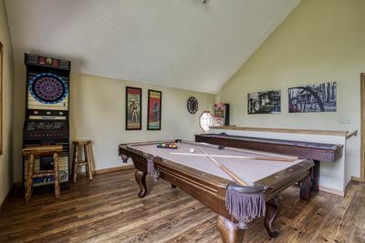 Best Time Ever upper level game room with dart board