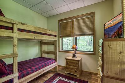 Best Time Ever lower level bedroom with bunk beds