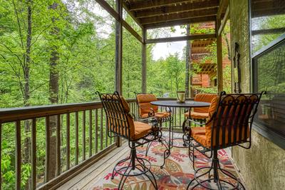 Best Time Ever covered back deck with high top table and chairs