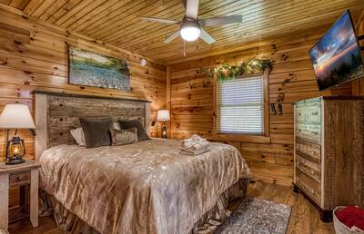 My Pigeon Forge Cabin - Main level bedroom 1 with king size bed