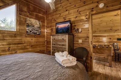 My Pigeon Forge Cabin - Upper level bedroom with 50-inch TV