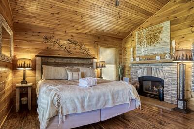 Cabin Fever bedroom with gas fireplace