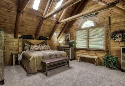 Creekside Lodge - Upper level bedroom with king size bed