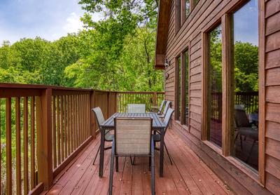 Black Bear Lodge - Wrap around deck with table and chairs