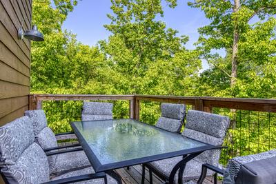 Wild Heart Lodge - Wrap around deck with table and chairs