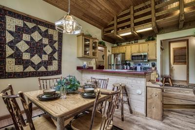 Reflections - Dining area and fully furnished kitchen