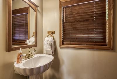 Reflections - Half bath located off living room