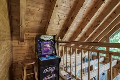 Papa's Pad main level loft area with arcade machine