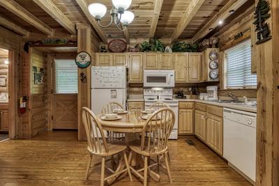 A Smoky Getaway - Dining area and fully furnished kitchen