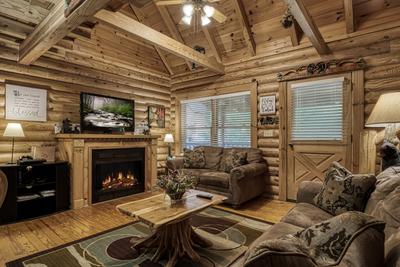 A Smoky Getaway - Living room with wood encased gas fireplace