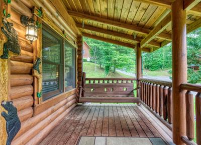 A Smoky Getaway - Covered back deck with swing