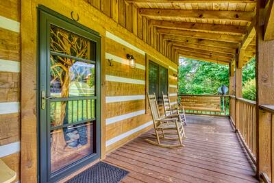 4 Paws Lodge covered front deck with rocking chair