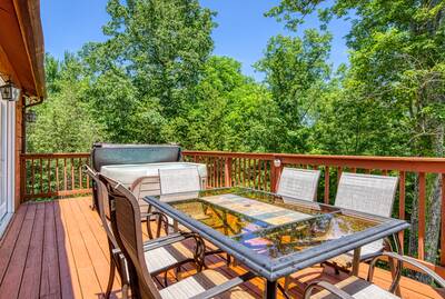 Serenity Ridge - Back deck with table chairs