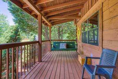 Serenity Ridge - Covered entry deck with swing