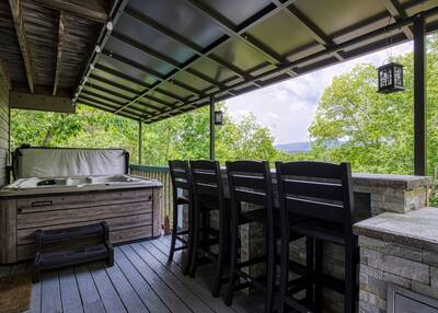 Majestic Poolside Lookout - Covered back deck with outdoor kitchen and hot tub