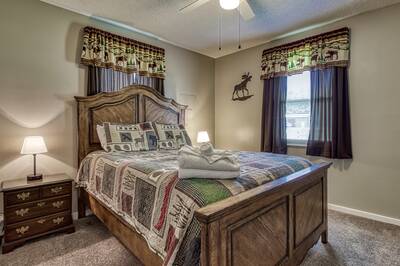 Rustic Acres bedroom with a queen size bed