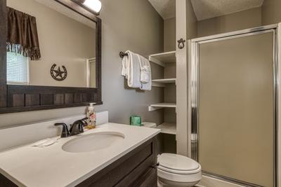 Rustic Acres bathroom with a walk in shower