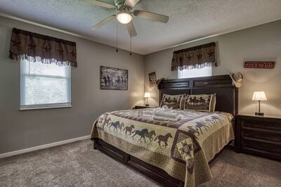 Rustic Acres bedroom with a king size bed