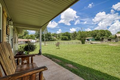 Rustic Acres covered entry deck