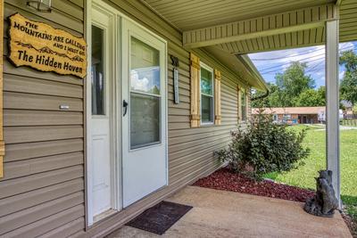 Rustic Acres covered entry deck