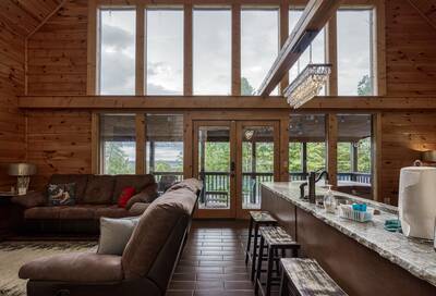 Winter Ridge living room with floor to ceiling windows